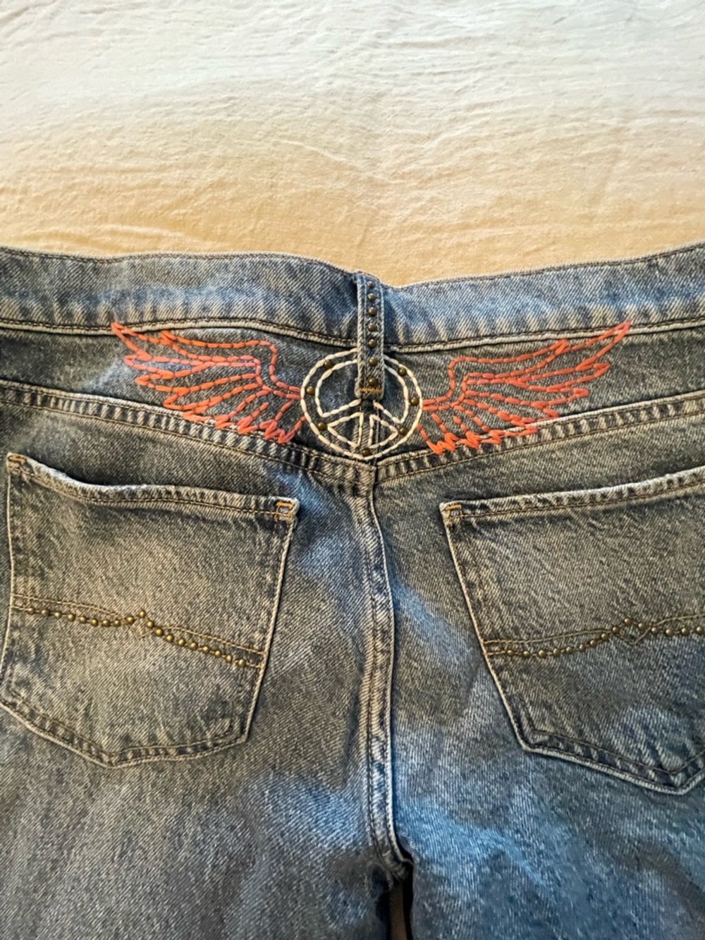 Lucky Legend Denim Jeans with Embroidered Peace Wing Detail